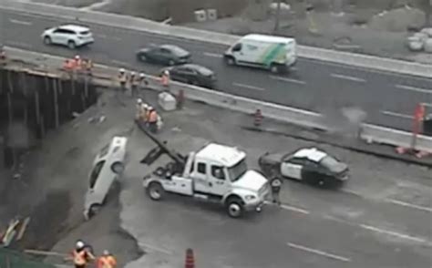 2 injured after driving into QEW construction zone pit